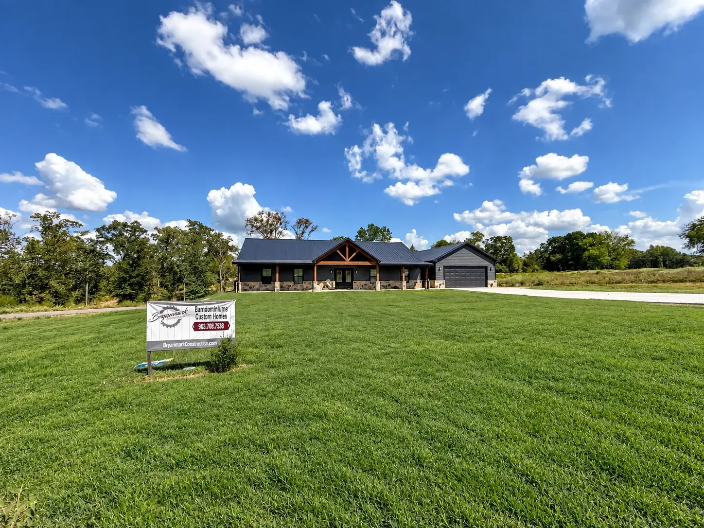 BryanMark home across a green lawn